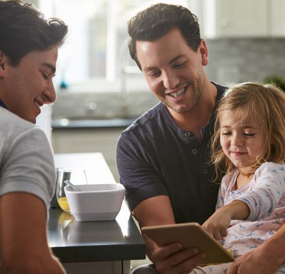 Happy family enjoying their home purchased with a mortgage from MidWestOne Bank.